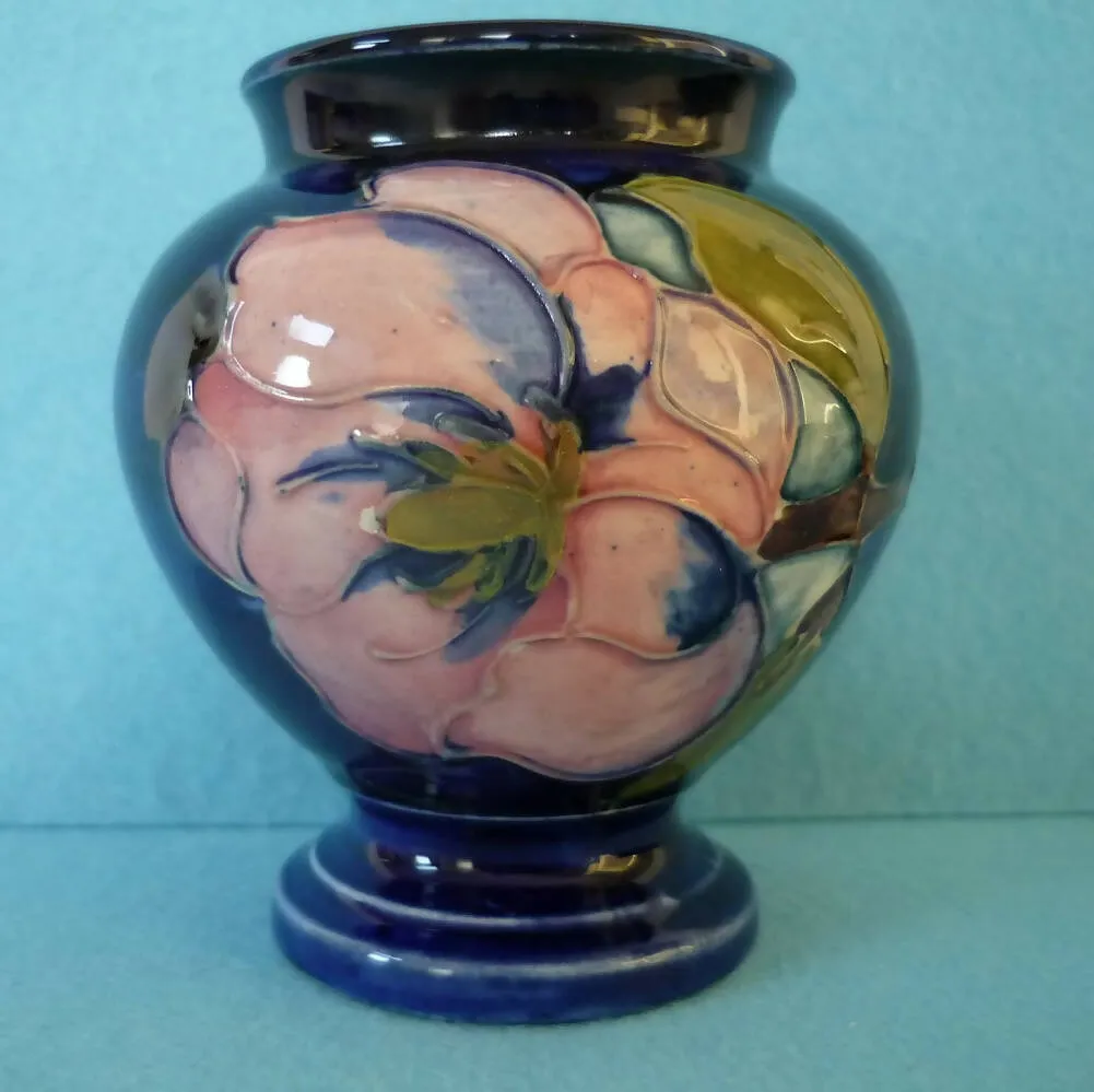 A Moorcroft Baluster Shaped Vase in Magnolia by Walter Moorcroft